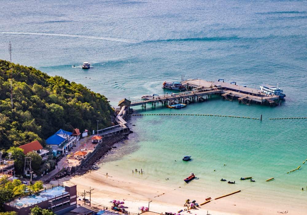 koh larn aerial view of a pier clear waters and white sand