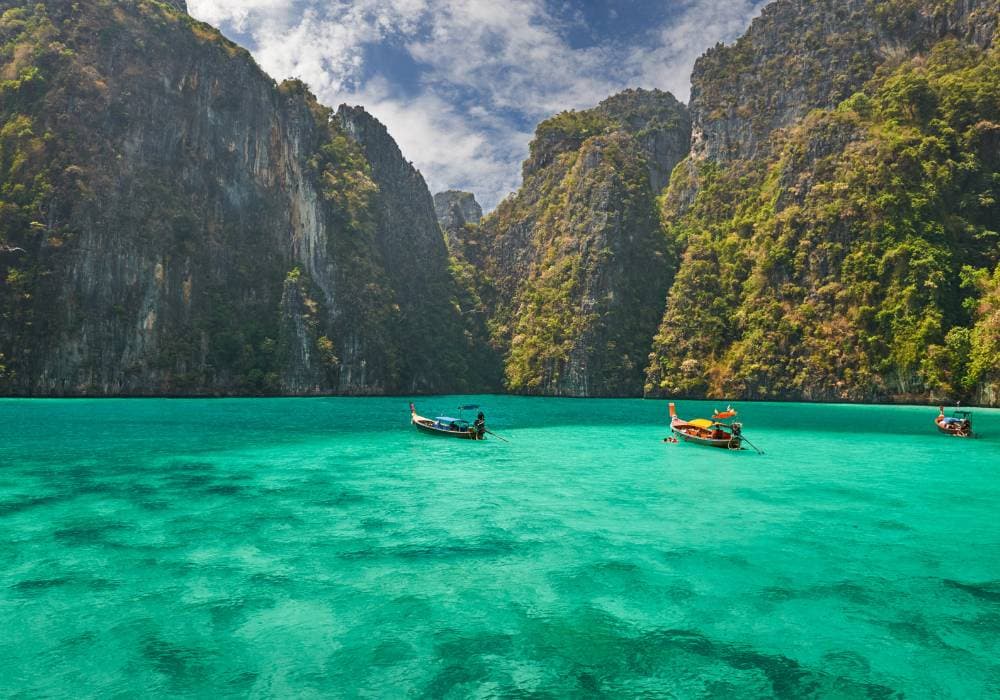 phi phi islands clear water with green limestone mountains