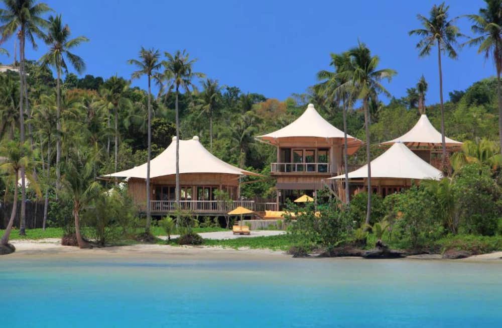 Soneva Kiri eco-luxury resort Koh Kood Thailand with private villas, outdoor living spaces, and sustainable design